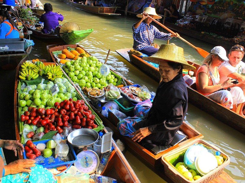 A vendor's boat loaded with fruit at Damnoen Saduak Floating Market